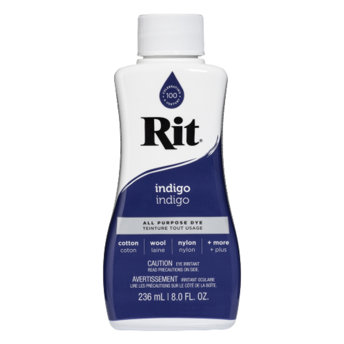 Bottle of Rit dye in indigo color on a white background