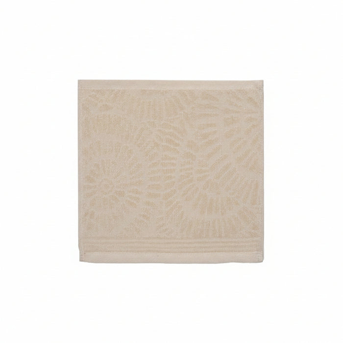 A square beige woven placemat with a raised circular floral pattern, shown flat against a white background.