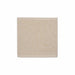 A square beige woven placemat with a raised circular floral pattern, shown flat against a white background.