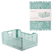 Green storage crate with packaging on a white background