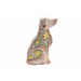 Decorative dog figurine with floral patterns on a white background