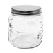 Clear glass jar with a metal lid on a white background