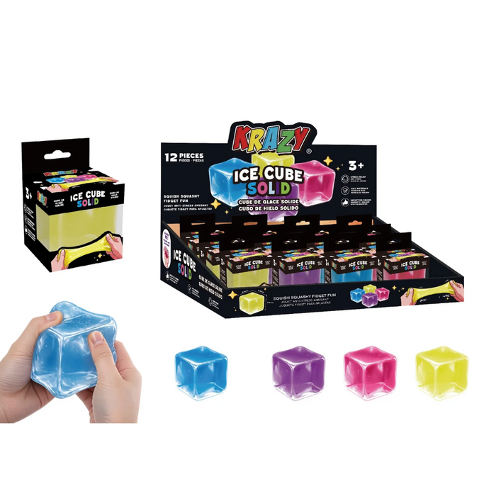 Krazy Ice Cube Gold toy set shown with a retail display box, a single package, four translucent blue ice cubes in different colors, and hands holding a blue cube. The packaging and display are black with bright multicolor graphics.