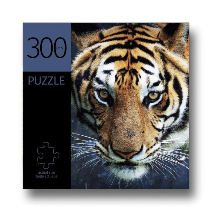 Jigsaw puzzle packaging with a tiger face on a white background