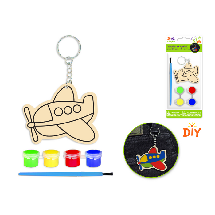 DIY airplane-themed wooden keychain craft kit with red, blue, yellow, green paints and a brush; includes finished keychain on black pants pocket.