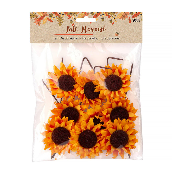 Pack of 9 artificial fall sunflower decorations in a clear plastic bag with a brown paper header card labeled 'Fall Harvest'.