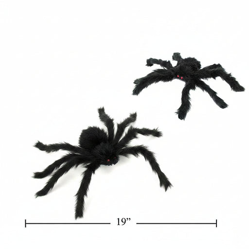 Two black fuzzy toy spiders on a white background, with one larger spider showing a small orange product tag and a 19-inch size marker line below.