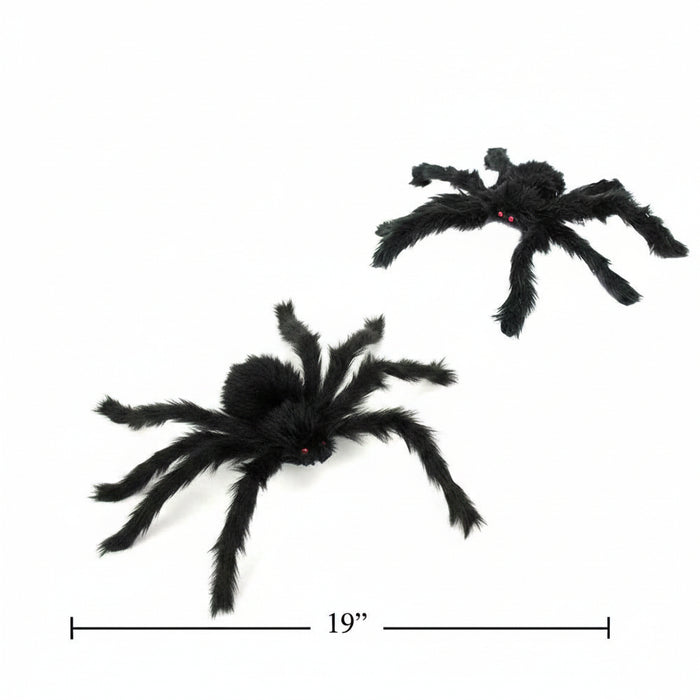 Two black fuzzy toy spiders on a white background, with one larger spider showing a small orange product tag and a 19-inch size marker line below.