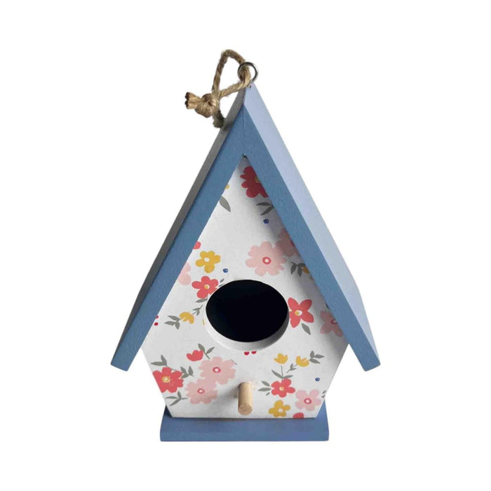 Floral-patterned birdhouse with a blue roof on a white background