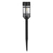 Black solar-powered garden light on a white background