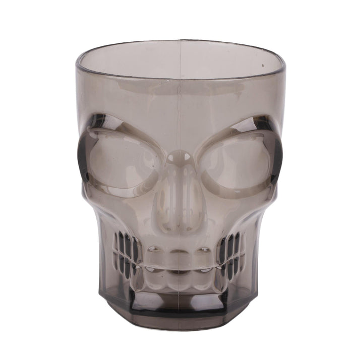 A translucent smoky gray plastic cup shaped like a skull, shown on a plain white background.