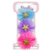 Set of three colorful hair accessories with star decorations on a pink card.