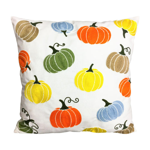 A square white throw pillow featuring a colorful pattern of hand-drawn autumn pumpkins in orange, yellow, green, and blue, with brown stems and curls, shown against a plain white background.