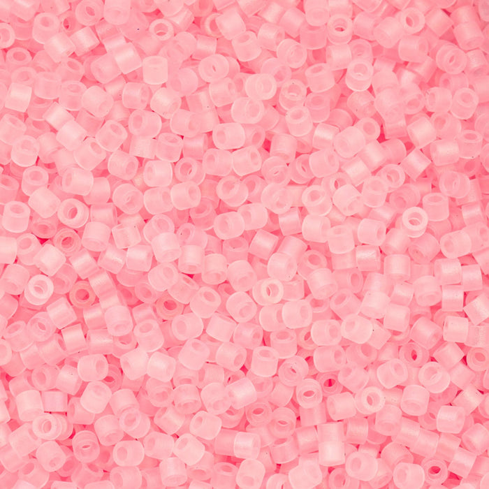 Close-up of pink beads on a pink background