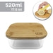 A clear glass container with a square shape and a bamboo lid. The container is labeled with 'ERAware' and a measurement of '520ml 17.