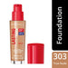 Rimmel London foundation bottle with red cap and beige body on a white background