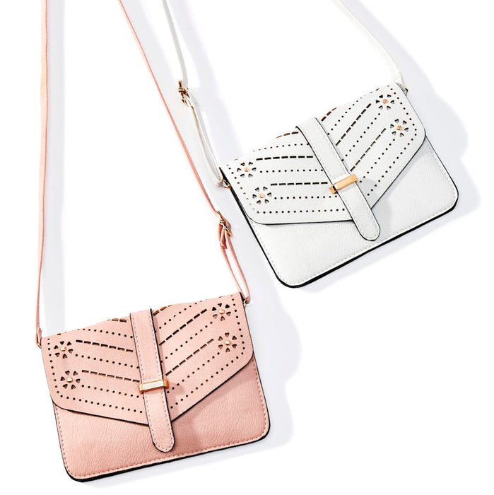 Two handbags, one pink and one white with black accents, on a white background.