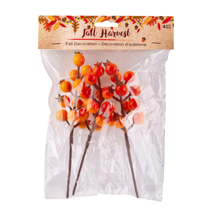 Packaged artificial fall harvest decoration featuring orange and red berries on brown stems inside a clear plastic bag with a cardboard header.