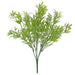 Artificial green plant on a white background