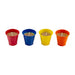 Four colorful metal cups with candles on a white background