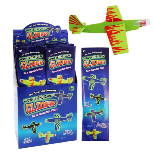 Glow-in-the-dark glider toy with packaging on a white background