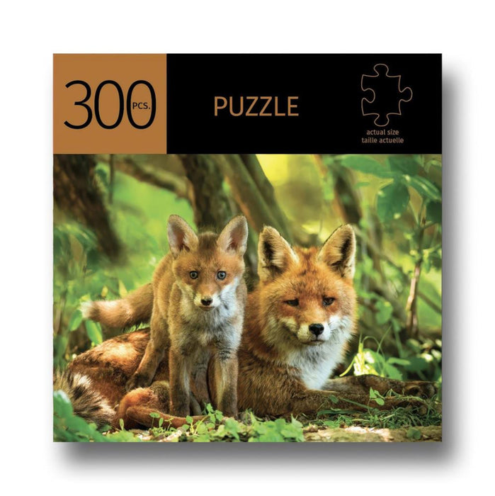 Jigsaw puzzle packaging with two foxes on a forest background